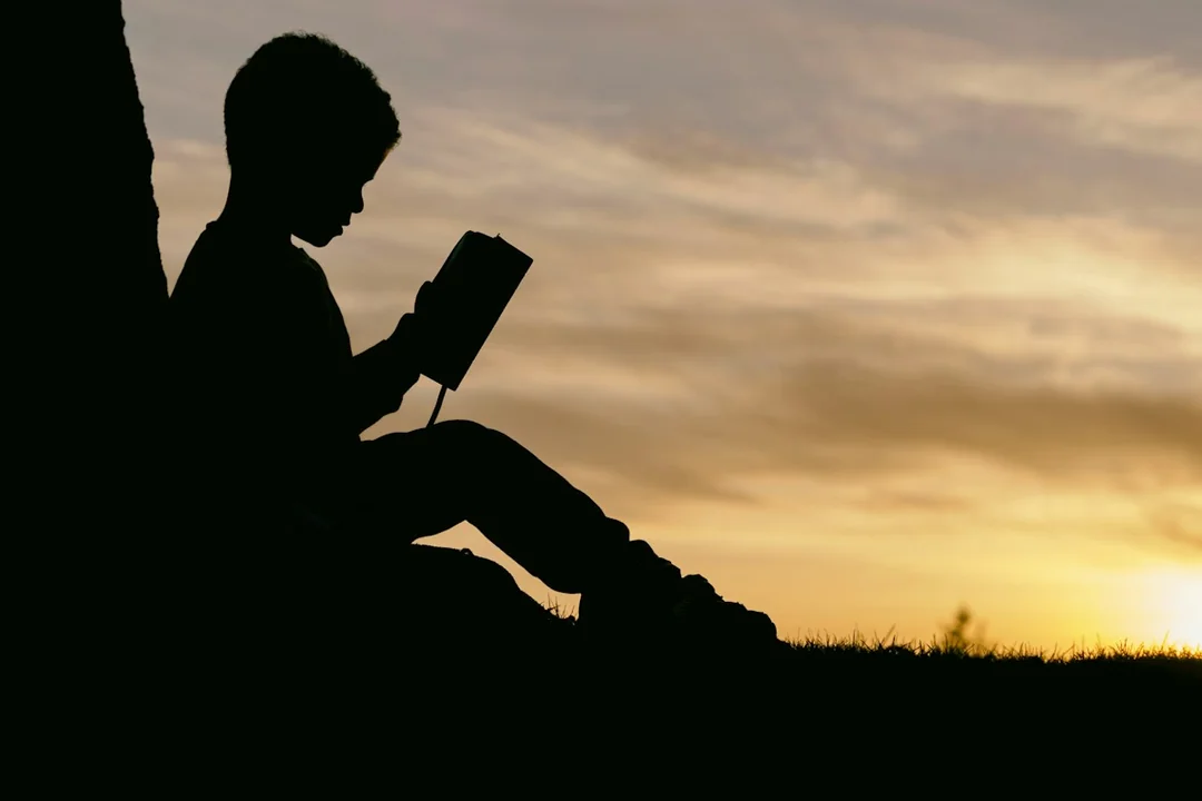 A reader with a book